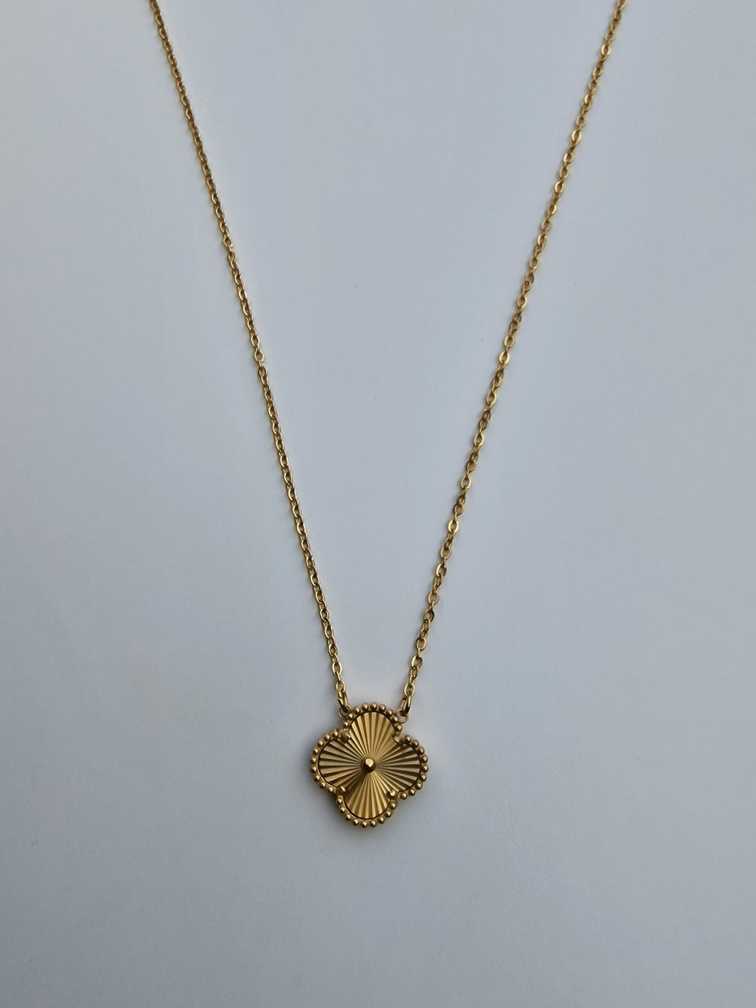 Gold charm necklace